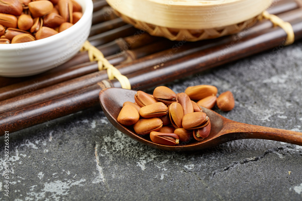Fototapeta premium Fried pine nuts