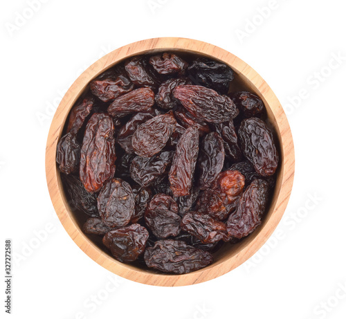 Top view of dried raisins isolated on white background