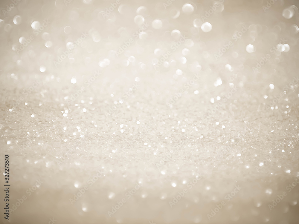 Golden background with soft bokeh lights. Golden background with soft bokeh lights.