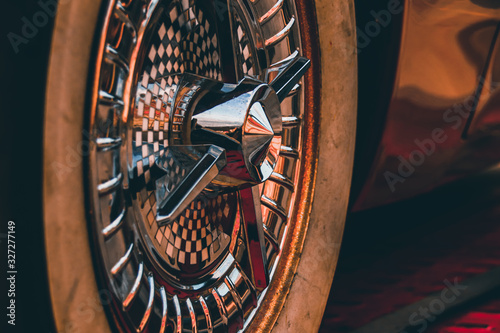 Vintage old timer car tire to show a 1920`s cinematic moody theme and nostalgia for the elegant and classic era