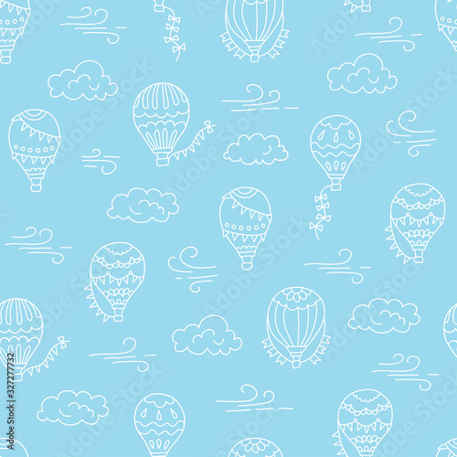 Hot air balloons and clouds. Hand drawn seamless pattern. Vector illustration in doodle style on blue background