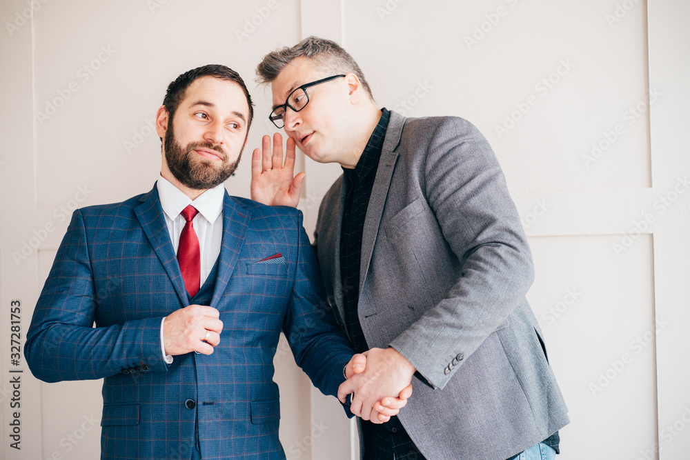 Business colleagues talking. Private discussion, small talk. Corporate and partnership concept. Gossip Business colleagues talking. Private discussion, small talk. Corporate and partnership concept. Gossip