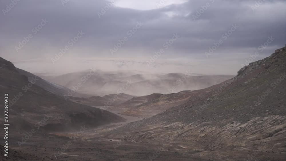 Volcanic landscape during ash storm on the Fimmvorduhals hiking trail. Iceland. Up to 30 miter per second Volcanic landscape during ash storm on the Fimmvorduhals hiking trail. Iceland. Up to 30 miter per second