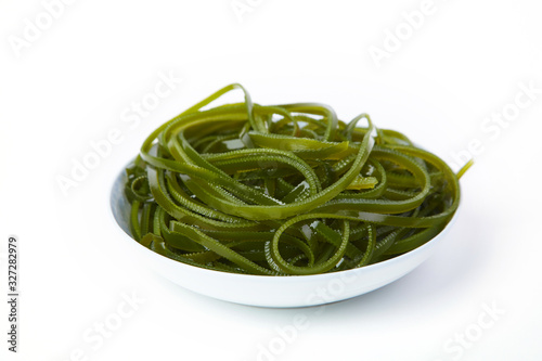 Fresh kelp knots on the plate,