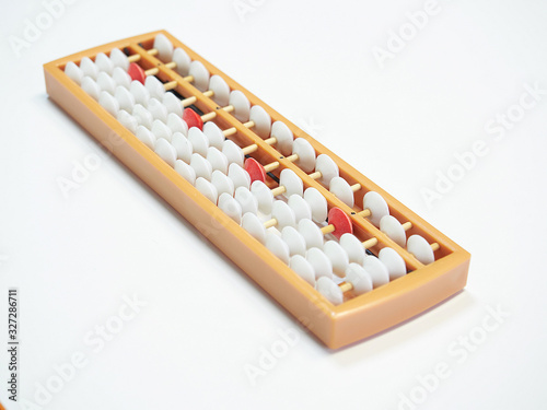 Classes in mental arithmetic  abacus soroban on white background. closeup.