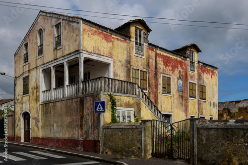 old house in azores, view of the facade of an old house at the azore, portugal