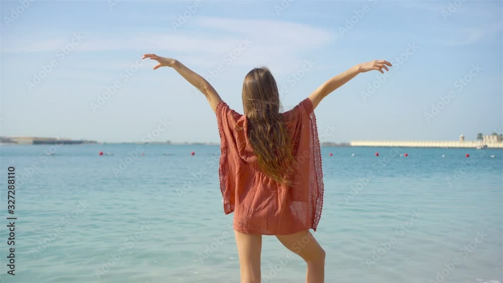 Happy girl enjoy summer vacation on the beach Happy girl enjoy summer vacation on the beach