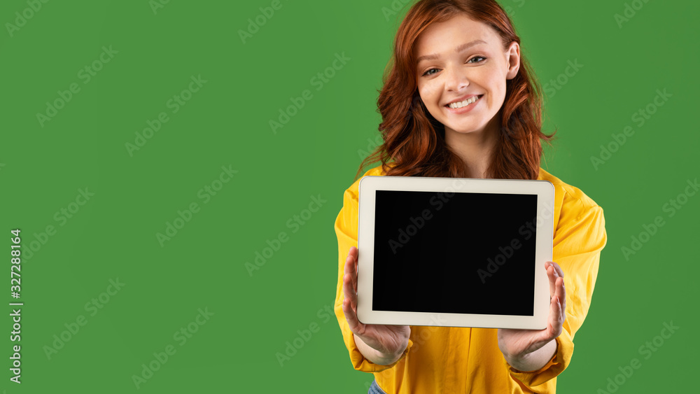 Girl Showing Digital Tablet Blank Screen Standing Over Green Background Girl Showing Digital Tablet Blank Screen Standing Over Green Background