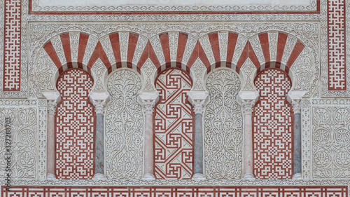 mezquita in cordoba, details, decoration over the external facade of wall of the mezquita in cordoba. andalusia. spain
