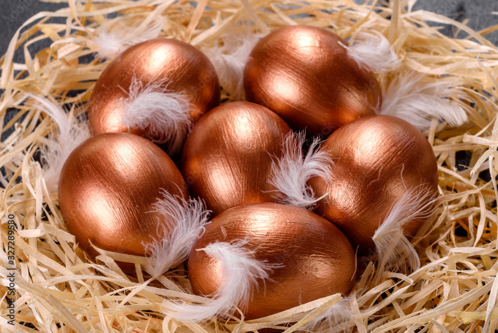 Easter golden eggs in the nest, preparation for the holiday Easter golden eggs in the nest, preparation for the holiday