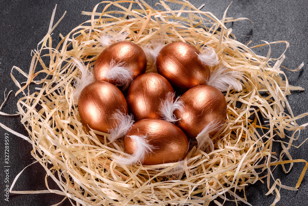 Easter golden eggs in the nest, preparation for the holiday Easter golden eggs in the nest, preparation for the holiday