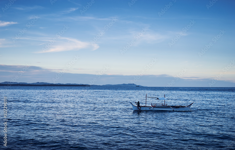 Seascape with philippines traditional fishing boat. Seascape with philippines traditional fishing boat.