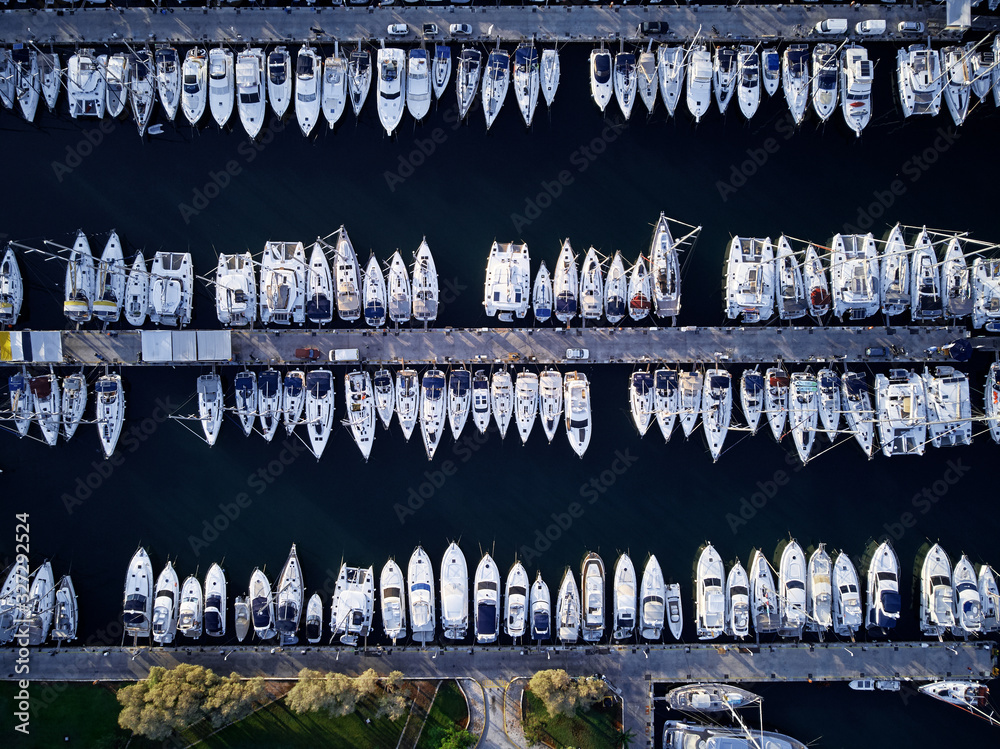 Aerial drone bird's eye view of marina in Athens with docked yachts. Aerial drone bird's eye view of marina in Athens with docked yachts.