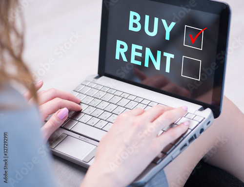 Businesswoman facing dilemma of buying versus renting