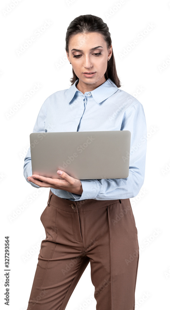 Serious young woman using laptop, isolated Serious young woman using laptop, isolated
