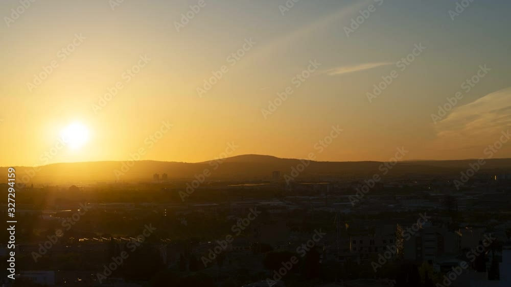 little cloudy sunrise with golden and blue tones over palma de mallora, balearic islands, spain little cloudy sunrise with golden and blue tones over palma de mallora, balearic islands, spain