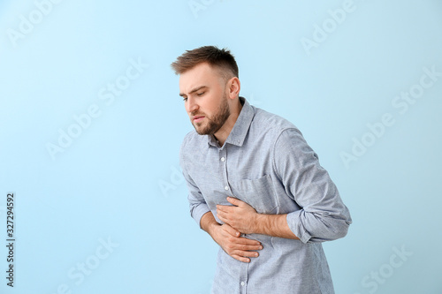 Young man suffering from ab...