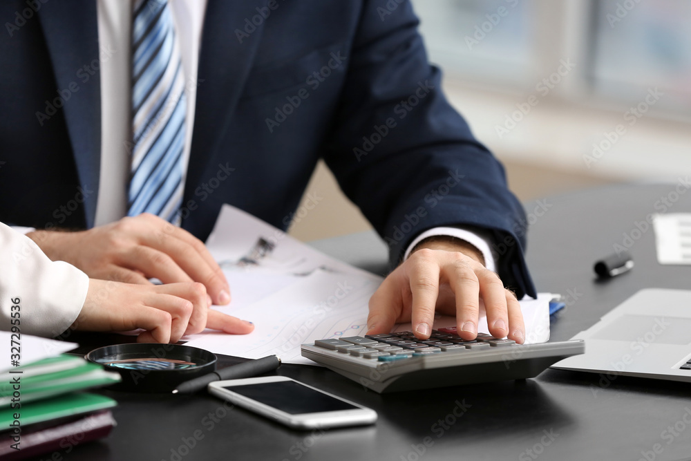 Accountants working in office, closeup Accountants working in office, closeup