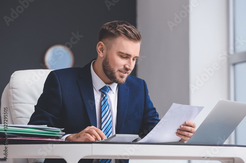 Male accountant working in ...