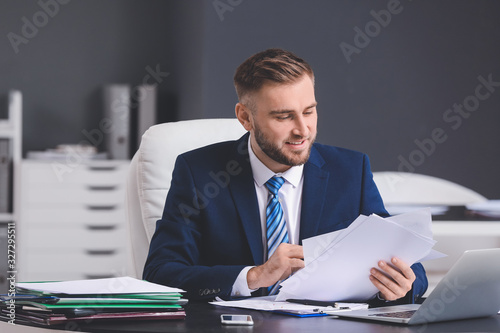 Male accountant working in ...