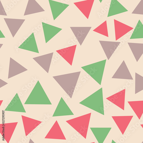 Triangles - geometric seamless pattern. Soft colors. Brown  red  green chaotic triangles on a beige background. Abstraction for printing  rolls  paper  membranes  fabrics  gifts  etc.