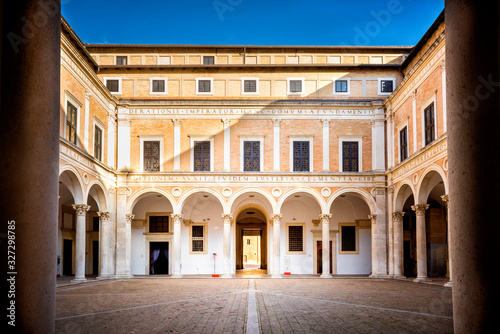 URBINO - ITALY –  Courtyard of Palazzo Ducale (Ducal Palace), now a museum, in Urbino. Marche region, Italy.