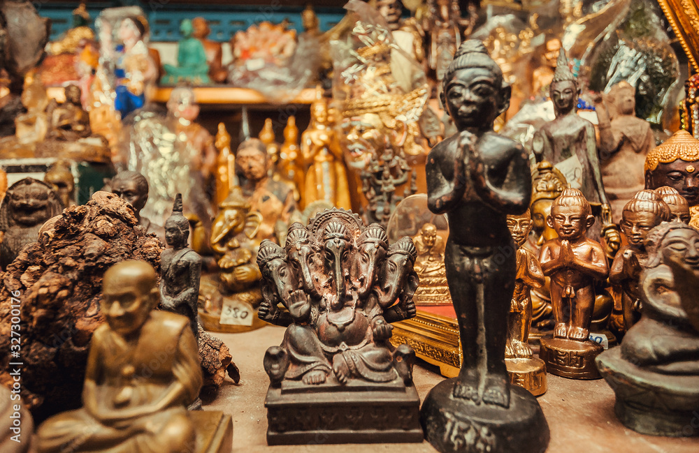 Ganesh statue, Buddha and many others figurines for sale in store of the Amulet Market Ganesh statue, Buddha and many others figurines for sale in store of the Amulet Market