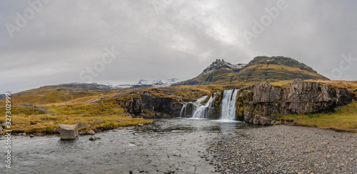 Kirkjufell in Iceland Kirkjufellsfoss waterfall panorama of complete setting