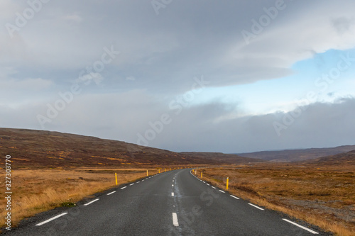 Roadtrip in Iceland driving over mountain pass in Westfjords during autumn