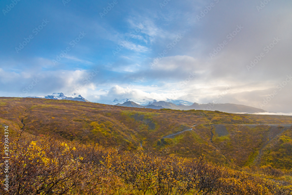 Vatnajoekull glacier colorful autumn landscape in front of icy mountain tops