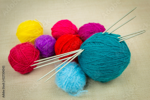 Multi-colored skeins of knitting needles