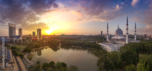 super panorama sunset view aerial shot with mosque and lake in the frame