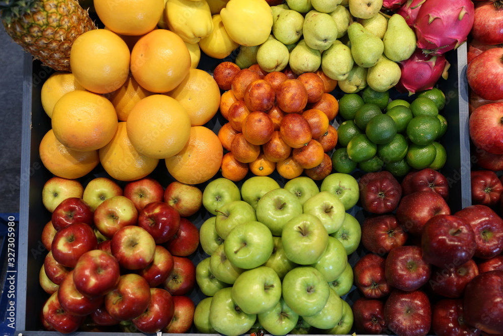 Various fresh summer exotic fruits for sale on market Various fresh summer exotic fruits for sale on market