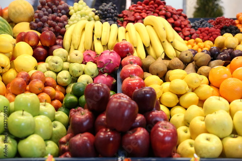 Various fresh summer exotic fruits for sale on market