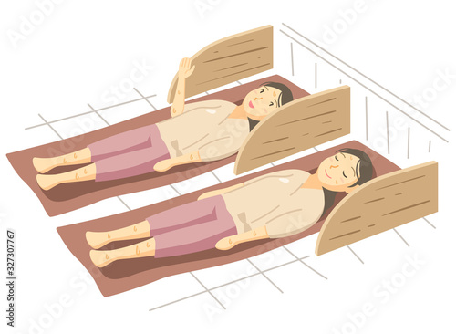 岩盤浴をする2人の女性（友達と一緒に温泉施設へ）