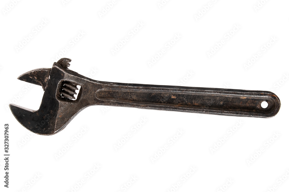Old tools. Adjustable spanner wrench isolated on white background Old tools. Adjustable spanner wrench isolated on white background