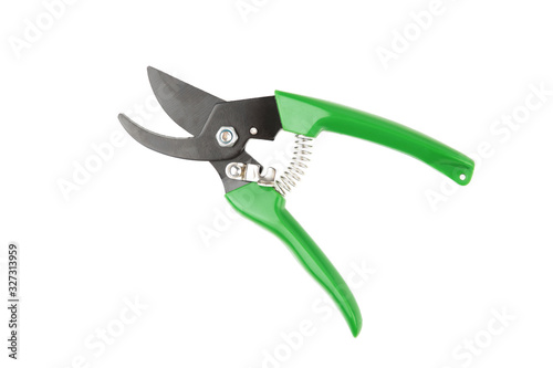 Green garden secateurs isolated on white background photo