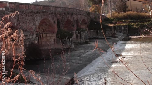 The Leproso bridge in Benevento is an ancient humpback architectural structure that allows you to cross the River Sabato photo