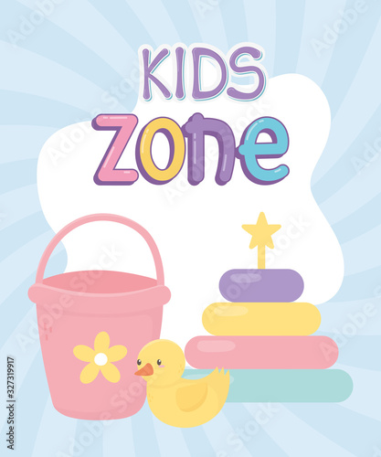 kids zone  bucket rubber duck and puzzles tower toys sunburst background