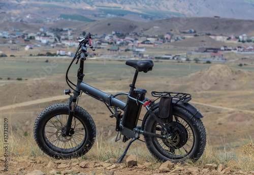 Electric bike on a hill in the mountains