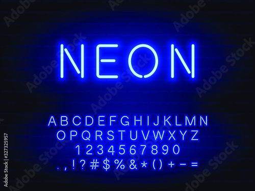 Set of bold blue neon font. Letters, numerals, signs, icons with transparent glow for web design and advertising