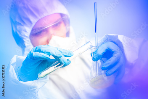 A chemist connects chemical...