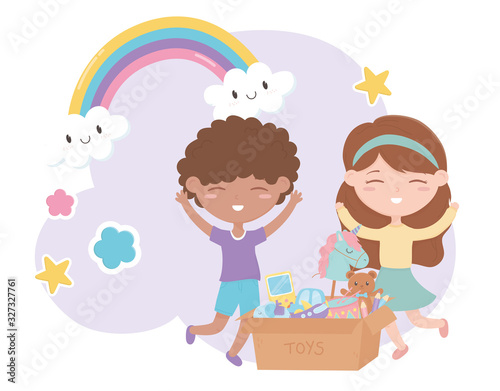 kids zone, boy and girl with cardboard box of toys