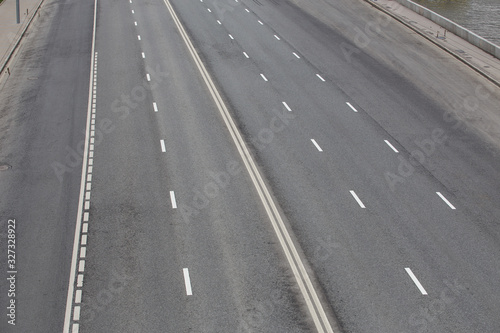 Multi-lane highway with markings on asphalt