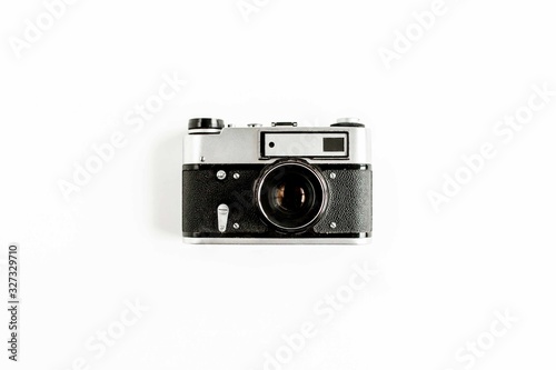 Retro camera isolated on white background. Flat lay, top view.