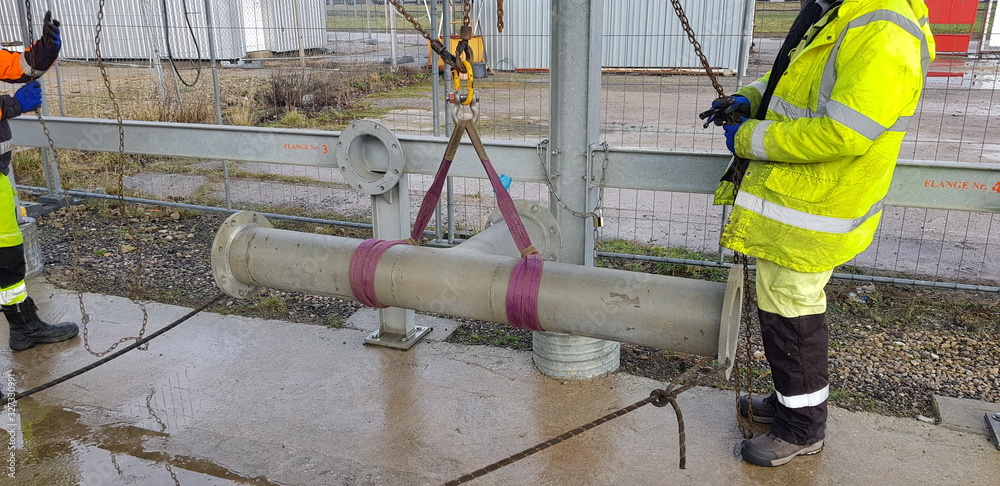 Riggers Moving Pipe Using Two Chain Blocks Stock Photo Adobe Stock riggers-moving-pipe-using-two-chain-blocks-stock-photo-adobe-stock