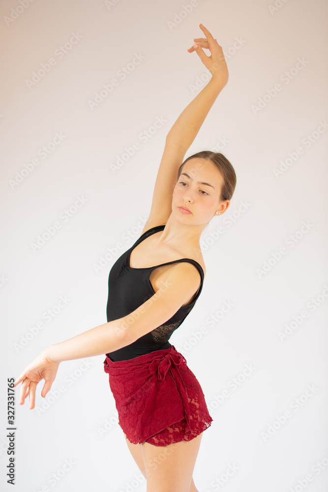 Young beautiful flamenco dancer posing for camera Young beautiful flamenco dancer posing for camera
