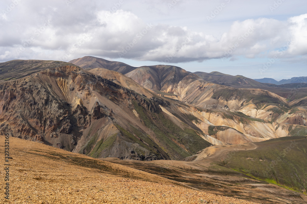 Landmannalaugar Colorful mountains on the Laugavegur hiking trail. Iceland. The combination of layers of multi-colored rocks, minerals, grass and moss
