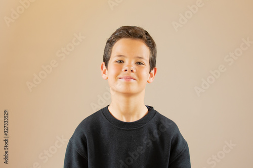 Portrait of a handsome smiling young boy photo