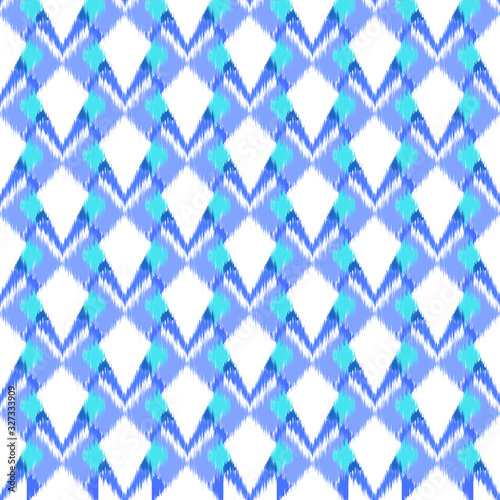 Ikat seamless colorful geometric pattern. Abstract background texture.